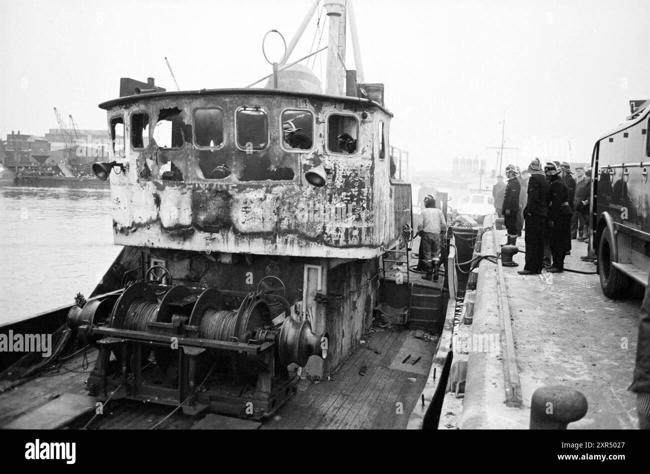 Firefighters at the Katwijk ship KW 12 after a fire at sea in the engine room. Here in the port of IJmuiden, IJmuiden, The Netherlands, 13-01-1966, Whizgle Dutch News: Historic Images Tailored for the Future. Explore The Netherlands past with modern perspectives through Dutch agency imagery. Bridging yesterday's events with tomorrow's insights. Embark on a timeless journey with stories that shape our future. Stock Photo