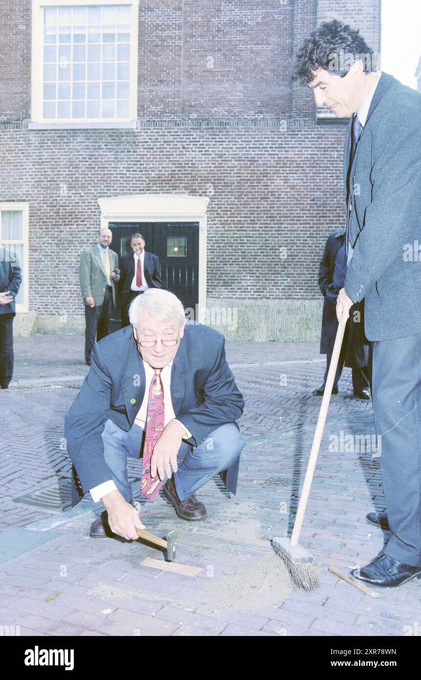 Frans Nypels Editor-in-chief Haarlems Dagblad lays a stone, Haarlem, The Netherlands, 24-09-1996, Whizgle Dutch News: Historic Images Tailored for the Future. Explore The Netherlands past with modern perspectives through Dutch agency imagery. Bridging yesterday's events with tomorrow's insights. Embark on a timeless journey with stories that shape our future. Stock Photo