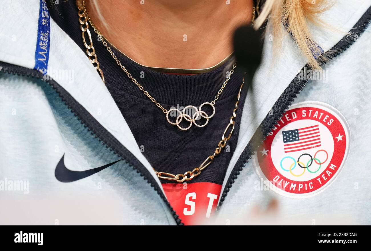 usa-s-lindsey-horan-sports-an-olympic-rings-necklace-during-a-press