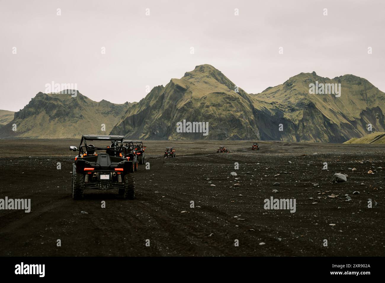 Buggy Convoy entering glacial park with epic mountain landscape Stock ...