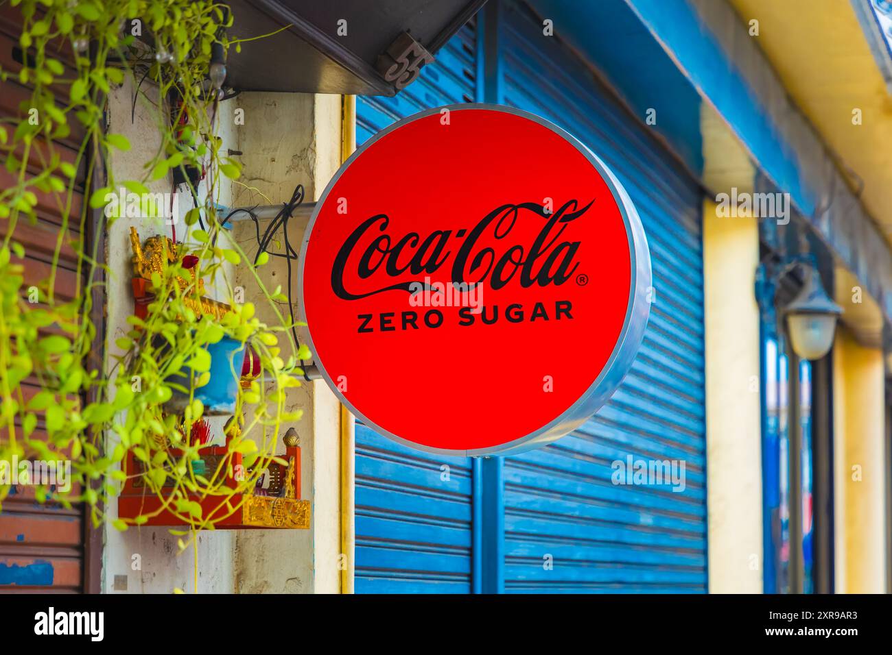 Sign of Coca Cola . The Coca Cola Company. Soft drink Sugar free sign board. Coca cola logo round sign. Thailand Phuket July 18,2024 Stock Photo