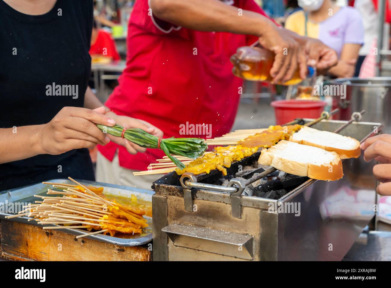 Moo satay, pork satay, thai cuisine. Traditional Thai steak roasted pork. Asian traditional food Pork Satay grill with sweet sauce. Stock Photo