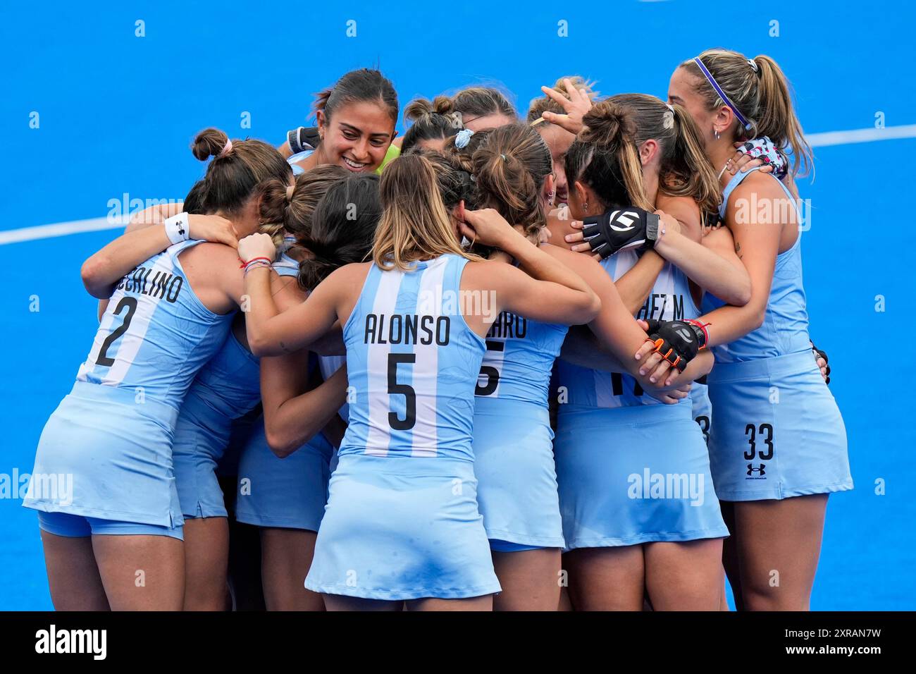 Argentina's players celebrate after winning the women's bronze medal ...
