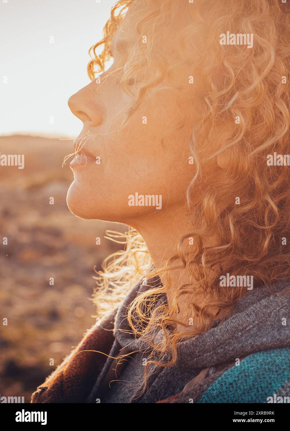 Middle age woman long curly hi-res stock photography and images - Alamy