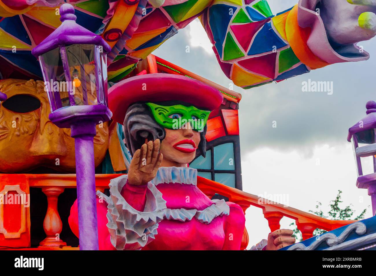 Vibrant celebration with colorful floats at a traditional traveling carnival Stock Photo
