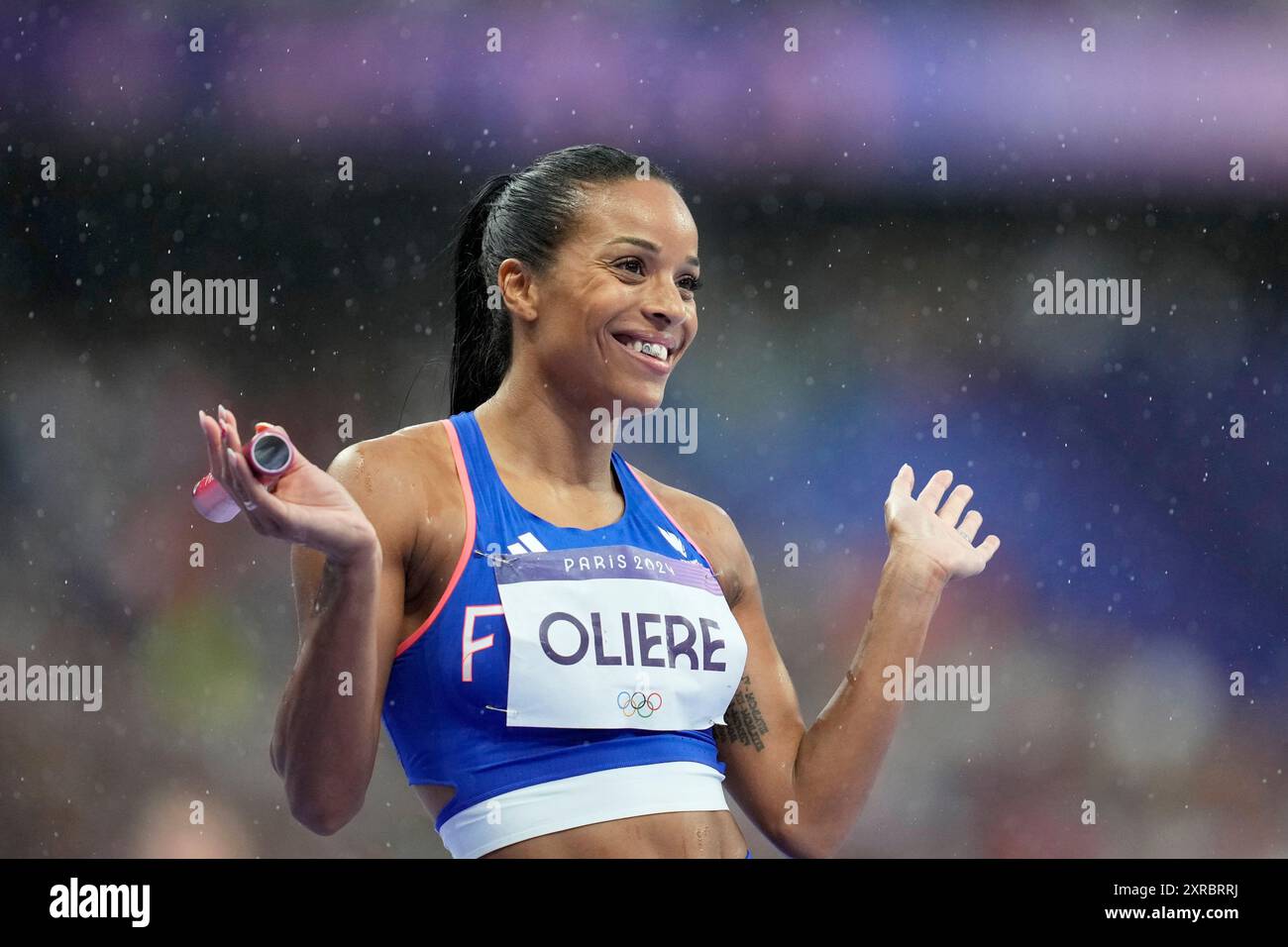 Orlann Oliere, of France, prepares to start in the women's 4 x 100