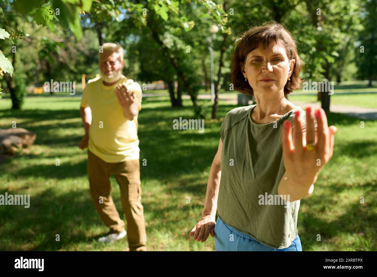 Sentior Dynamic Balance Toned senior people standing in pose for balance, they focused on ...
