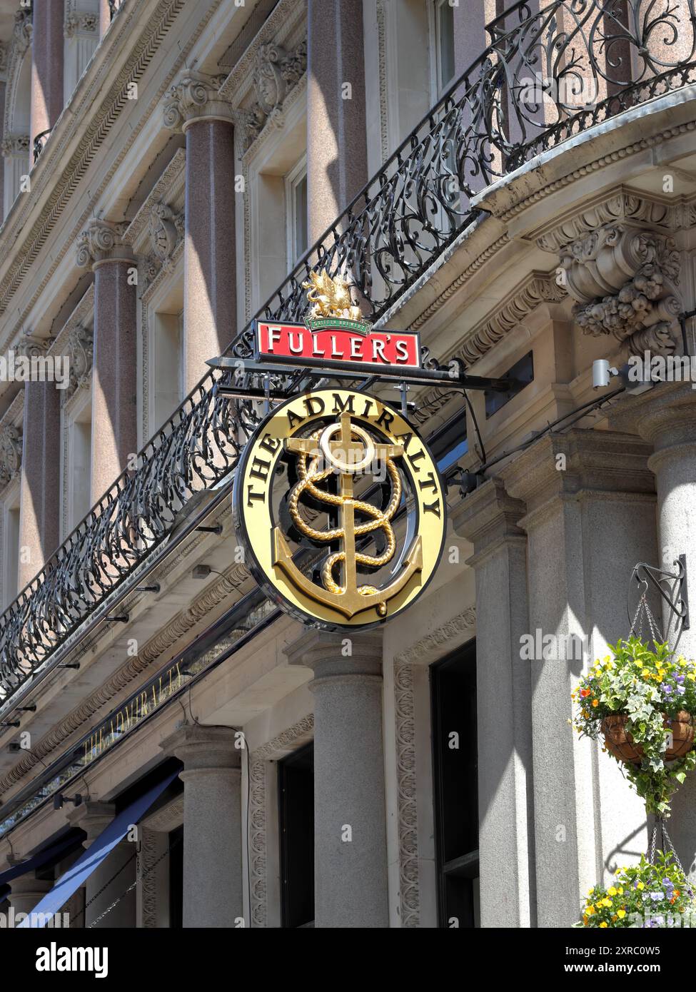 Hanging street sign of The Admiralty, a pub at 66 Trafalgar Square ...