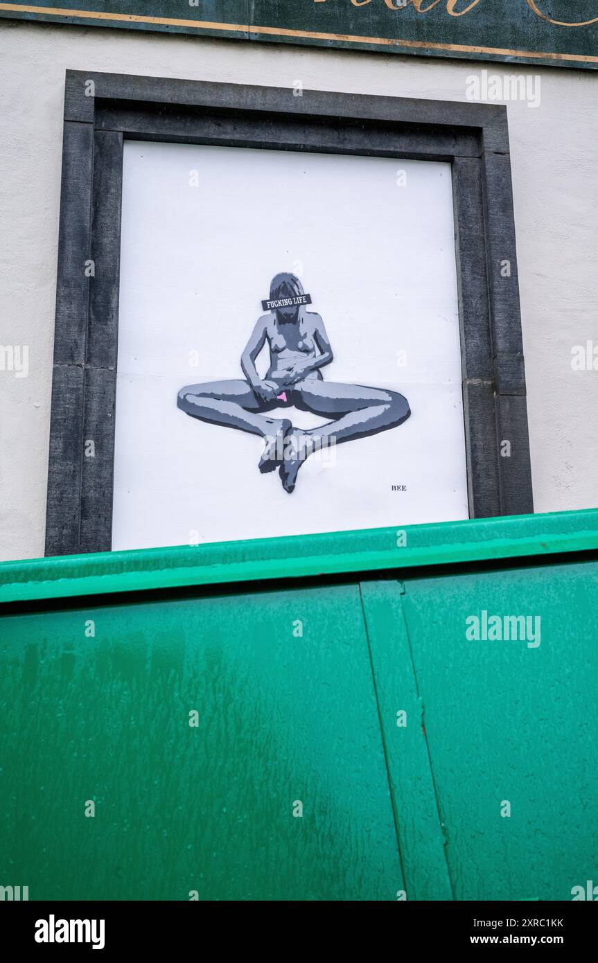 Banksy style murals and wall paintings in Bergen, Norway Stock Photo