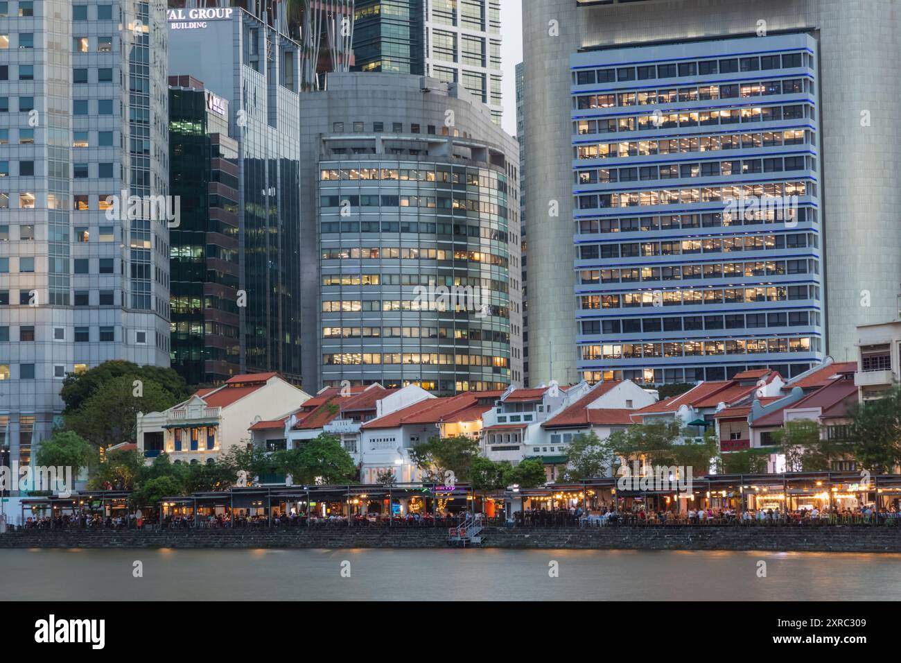 Asia, Singapore, Boat Quay and Singapore River with Riverside Pubs and Restaurants and City Business Area Buildings Stock Photo