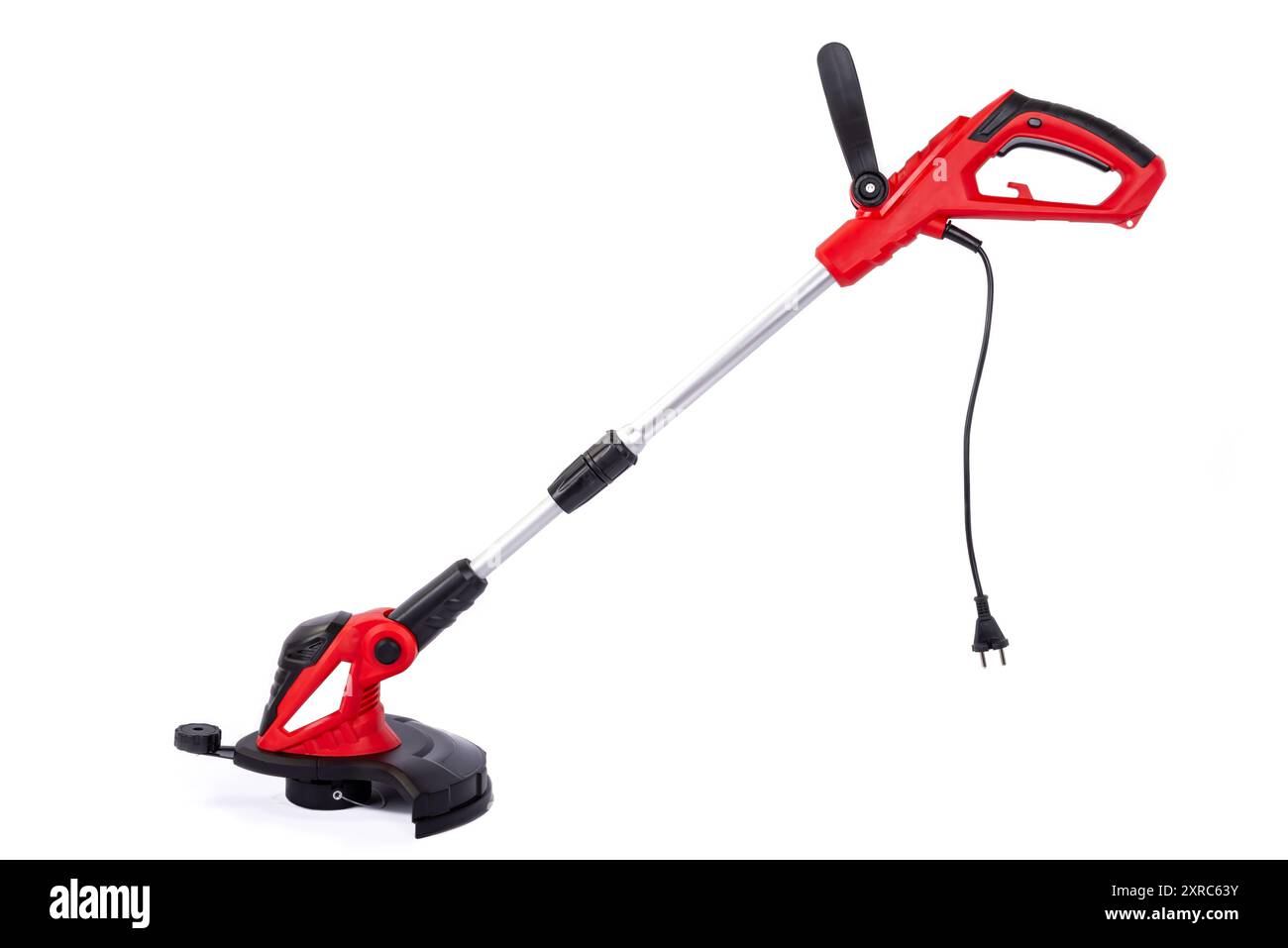High power electric trimmer for mowing the grass isolated on the white background. Stock Photo