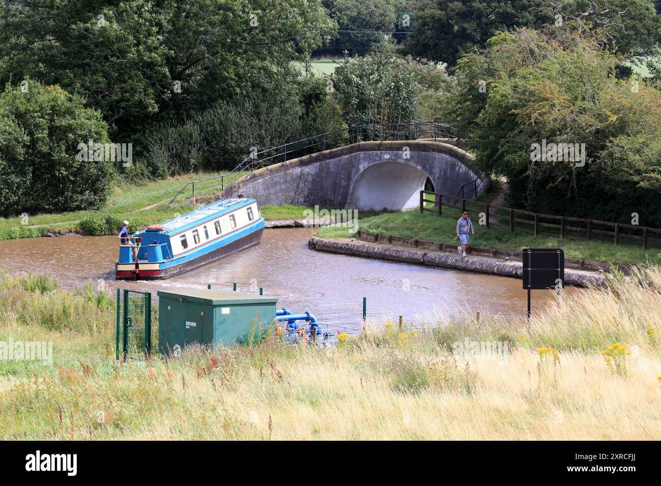 People on canal narrowboats at Hurleston Junction, where the Llangollen canal  the Shropshire union canal meet at Hurleston  junction Cheshire Stock Photo