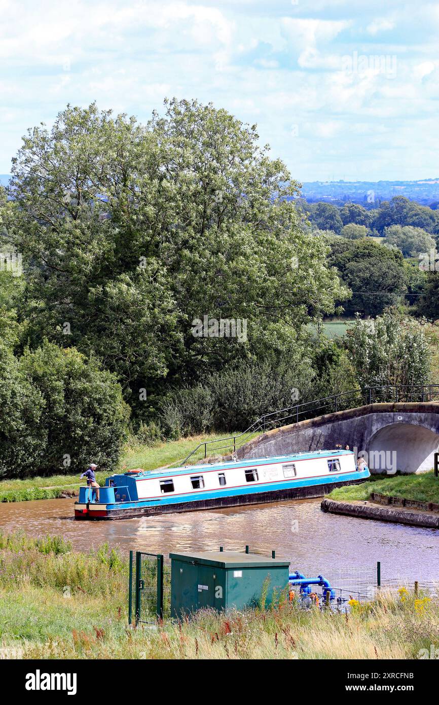 People on canal narrowboats at Hurleston Junction, where the Llangollen canal  the Shropshire union canal meet at Hurleston  junction Cheshire Stock Photo