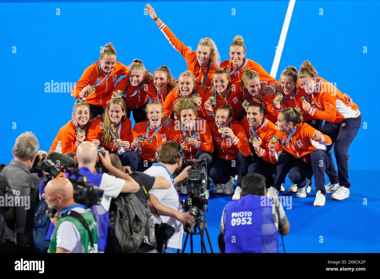 Team Netherlands poses for a photograph after winning the gold medal in ...