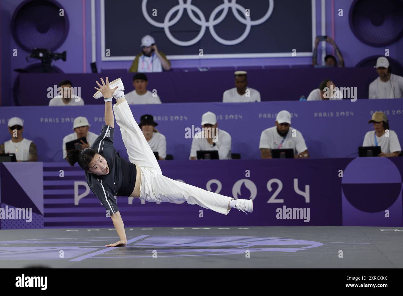 Paris, France. 9th Aug, 2024. Liu Qingyi of China, known as B-Girl 671, competes during the breaking B-girls bronze medal battle against India Dewi Sardjoe of the Netherlands, known as B-Girl India, at the Paris 2024 Olympic Games in Paris, France, Aug. 9, 2024. Credit: Shen Bohan/Xinhua/Alamy Live News Stock Photo