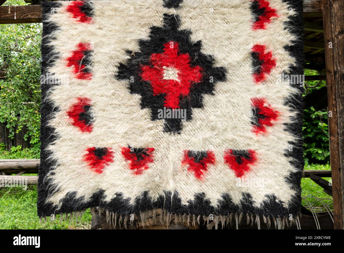 A traditional romanian wool rug background macro. Stock Photo