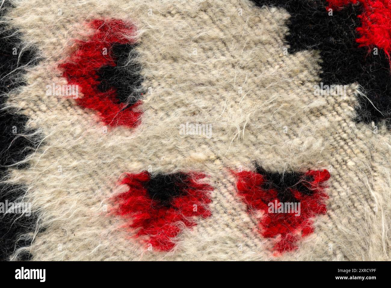 A traditional romanian wool rug background macro. Stock Photo