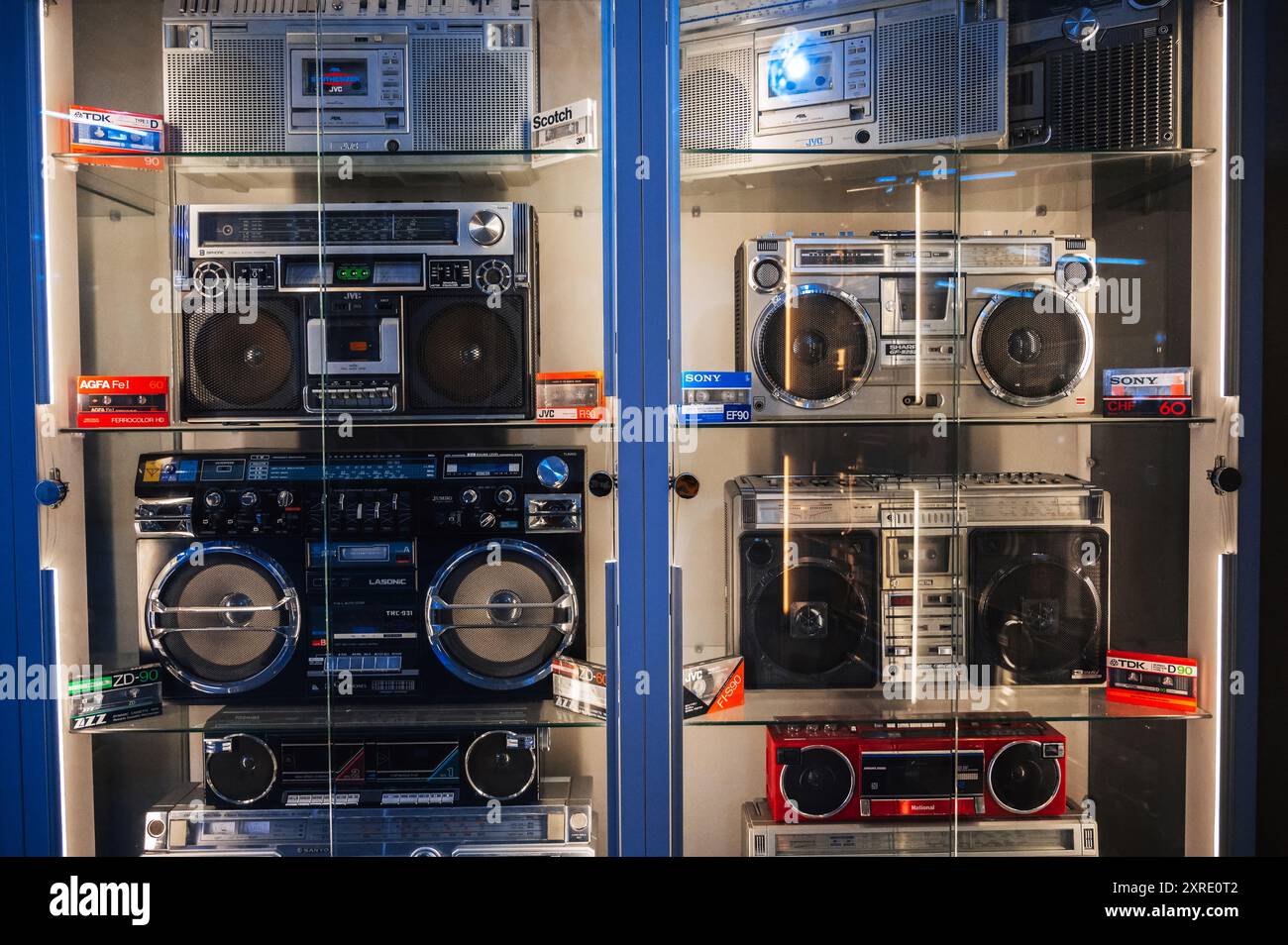 set of old retro vintage classic cassette recorders, portable boomboxes and tape audiocassettes on the store. Tashkent, Uzbekistan - April 16, 2024 Stock Photo