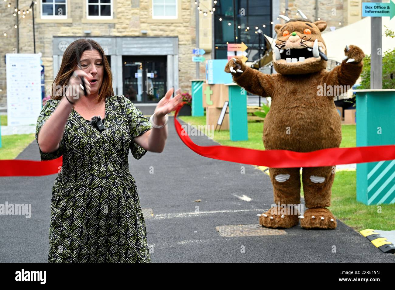 Edinburgh, Scotland, UK. 10th Aug 2024.  Edinburgh International Book Festival: Jenny Niven, Book Festival Director cutting the red tape at the official opening of this years Book Festival at the Futures Institute. Credit: Craig Brown/Alamy Live News Stock Photo