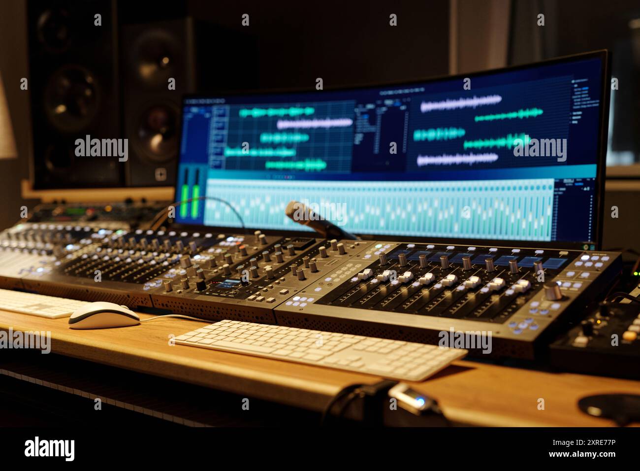 Audio mixing and recording being done with high-end studio gear ...