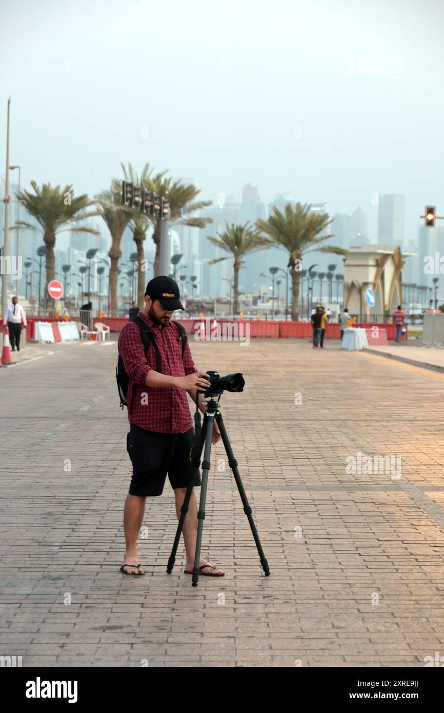 Young photographer in action hi-res stock photography and images - Alamy