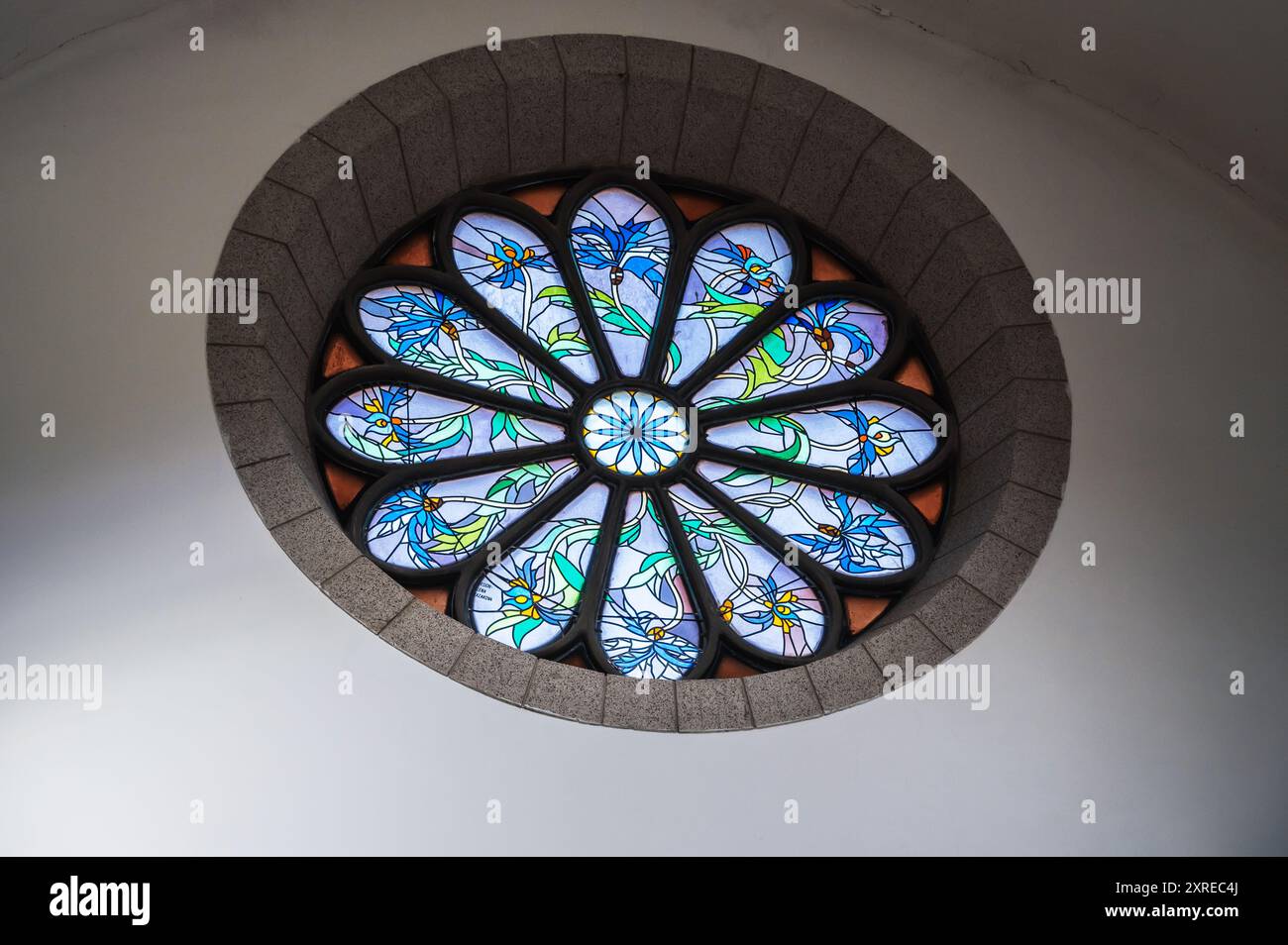 stained glass window decorated with mosaics inside an ancient Christian ...