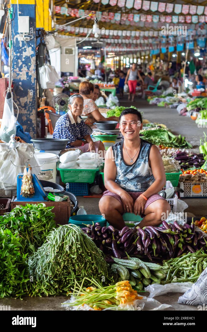 A typical Philippine market mostly selling vegetables in Ilocos Stock ...