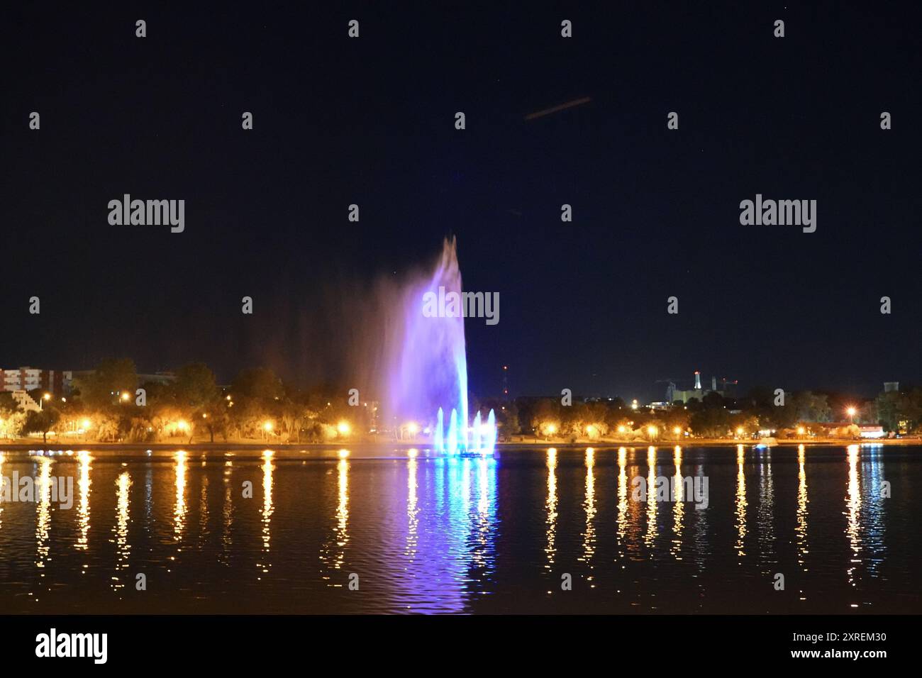 Illuminated Fountain at Night in Tulcea, Romania Stock Photo - Alamy