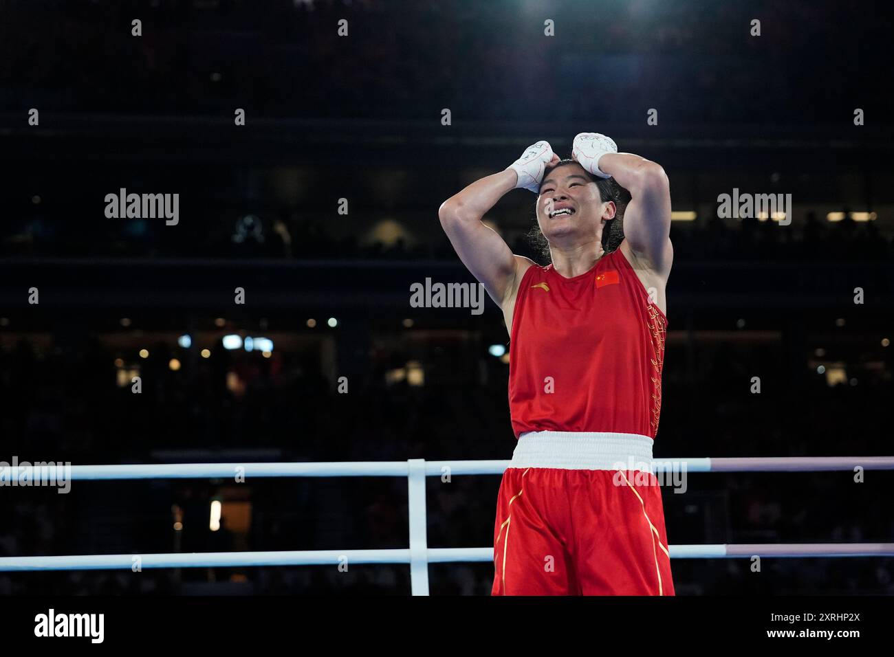 Li Quan Boxing China's Li Qian celebrates after defeating Panama's Atheyna Bylon in ...