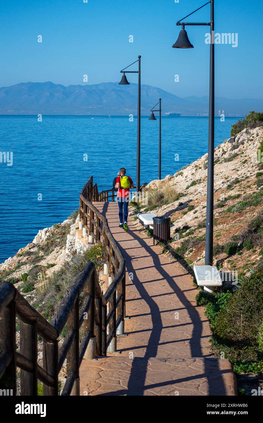 Spain Rincon RINCON DE LA VICTORIA, SPAIN - FEBRUARY 21, 2024: Morning walking on ...