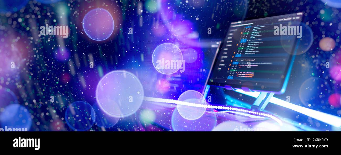 Program code on a computer monitor with fiber optic background. Internet and technology concept. Stock Photo