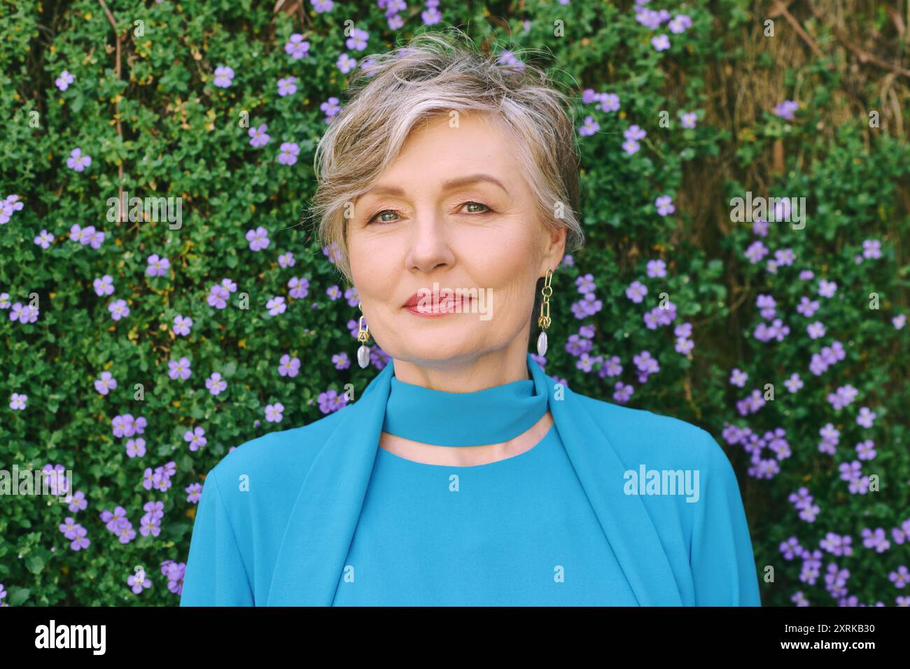 Mature woman spring clean happy hi-res stock photography and images - Alamy