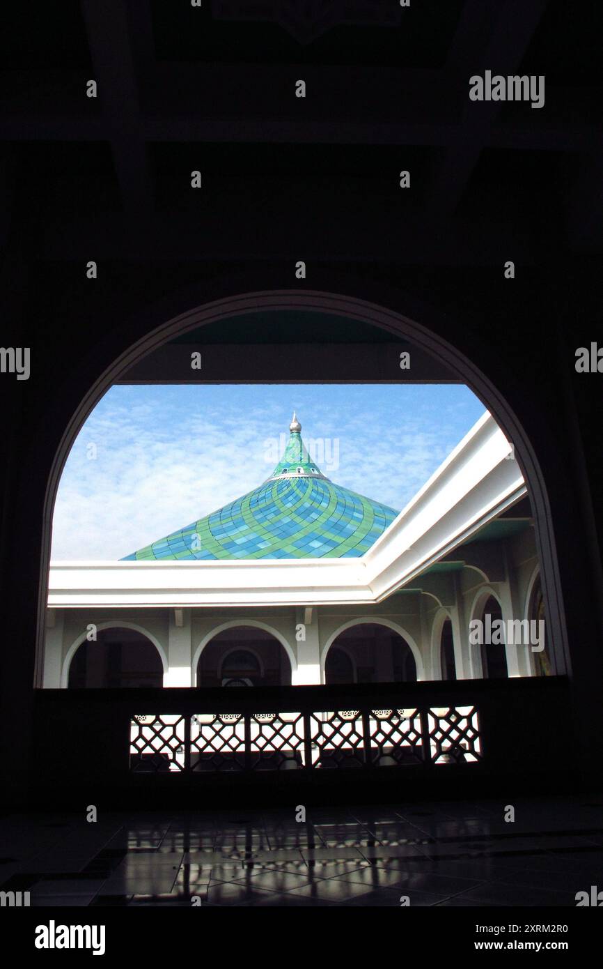 the dome of mosque against blue sky in framing Stock Photo - Alamy