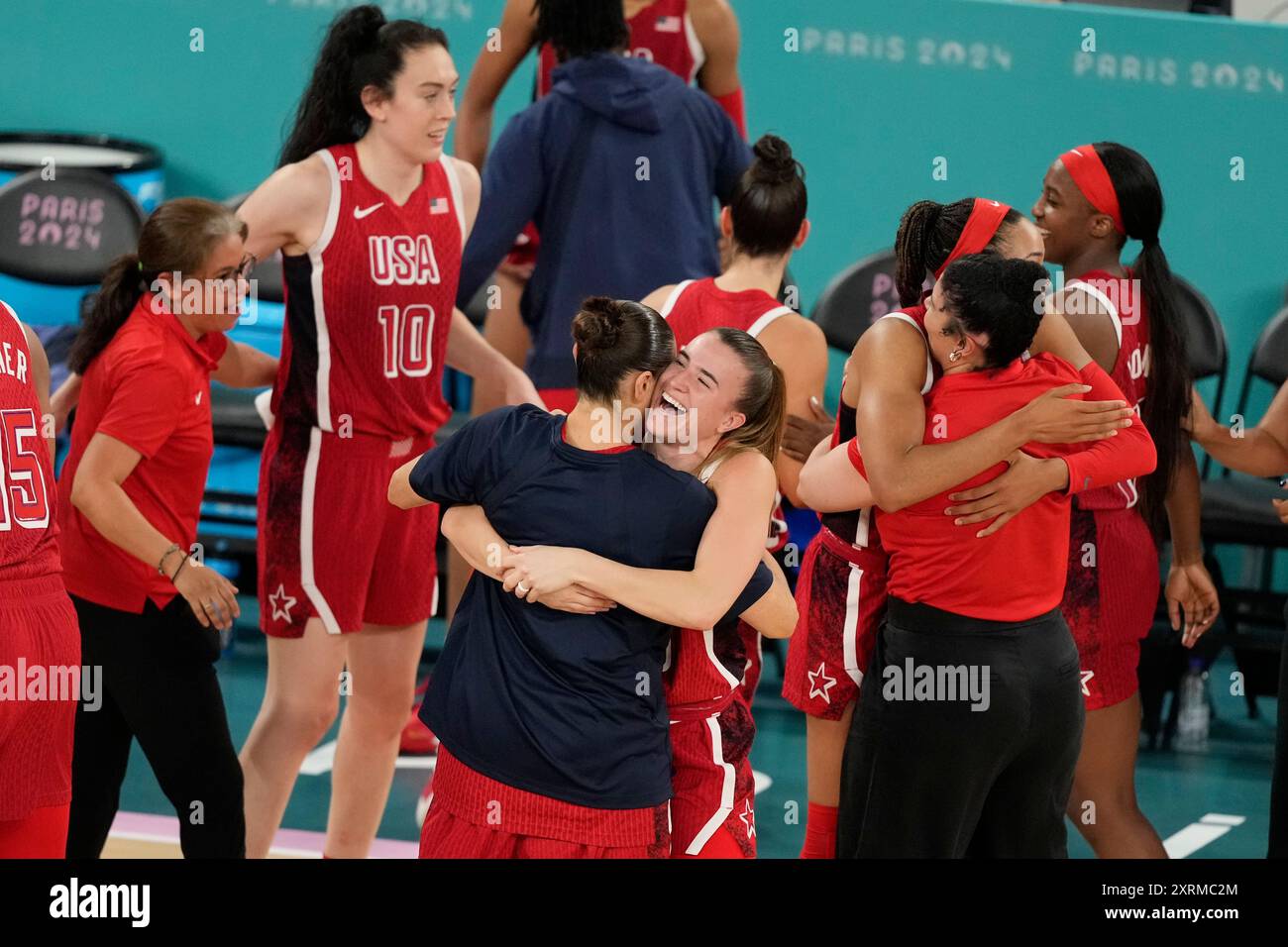 The United States Team Celebrates After A Women s Gold Medal Basketball the-united-states-team-celebrates-after-a-women-s-gold-medal-basketball