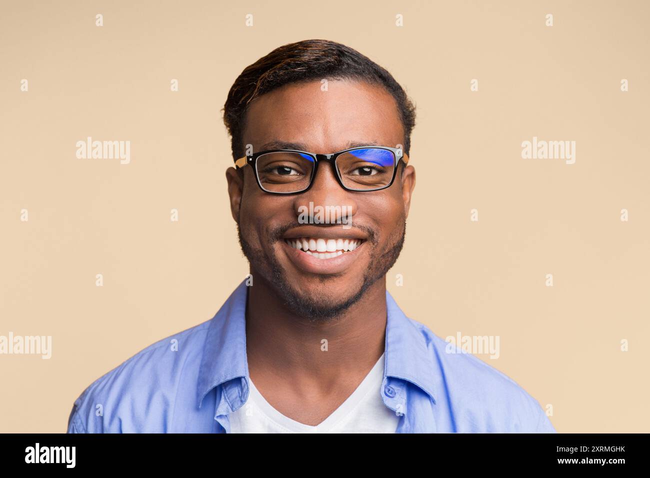 African American Man Smiling At Camera Posing Over Yellow Background ...