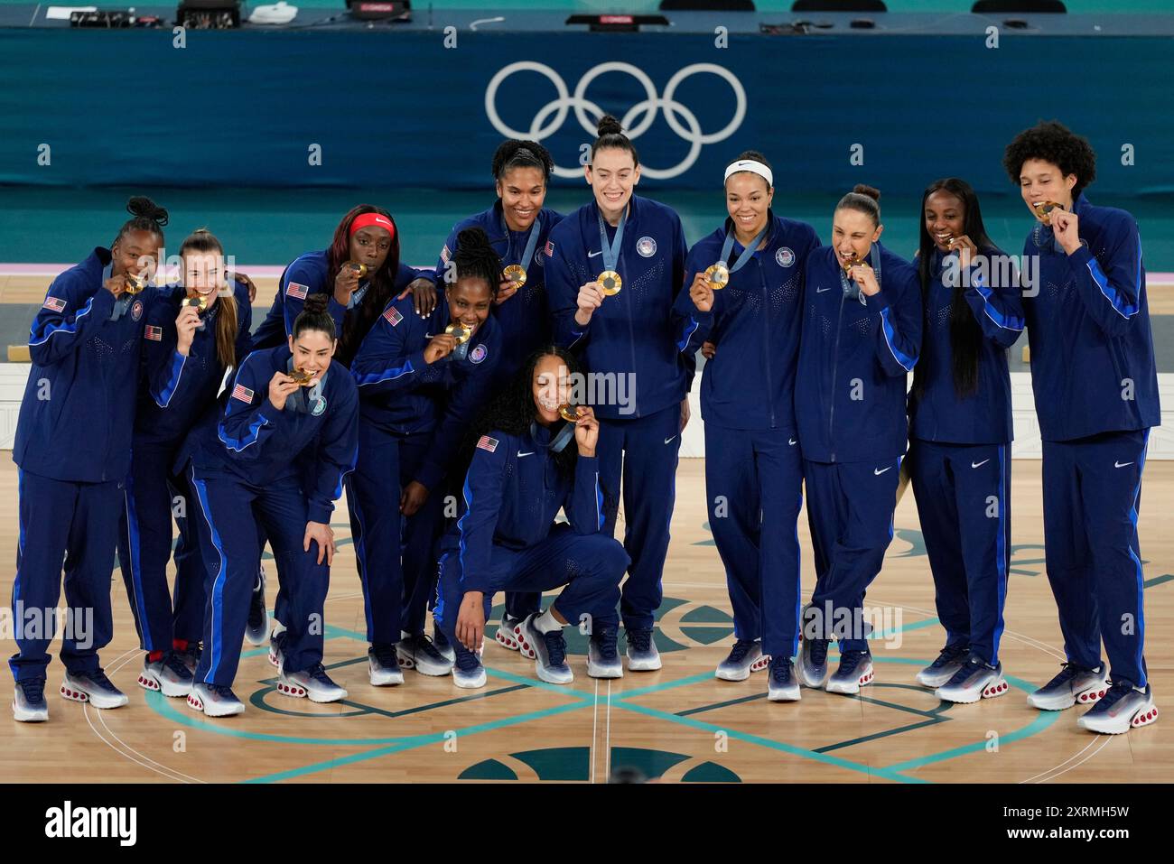 The United States team poses for a picture with their gold medals at ...