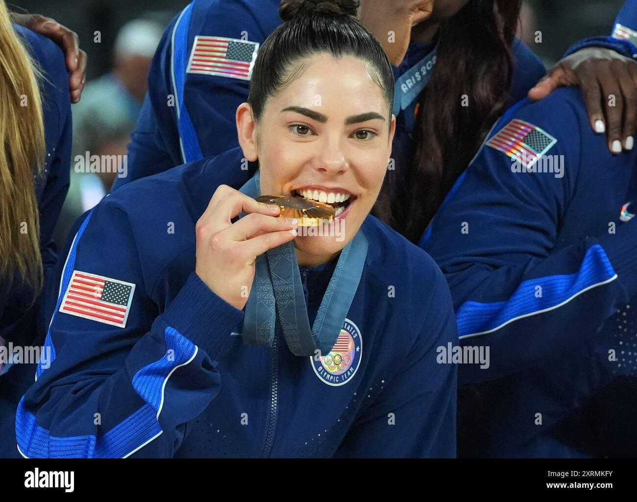 Paris, France. 11th Aug, 2024. Kelsey Plum of the U.S. bites her gold