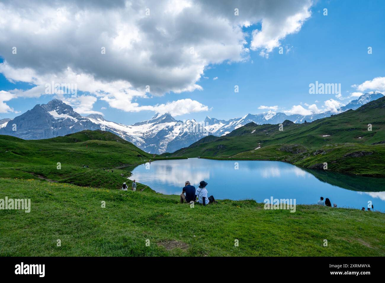 grindelwald-switzerland-july-20-2024-hikers-at-bachalpsee-lake-in