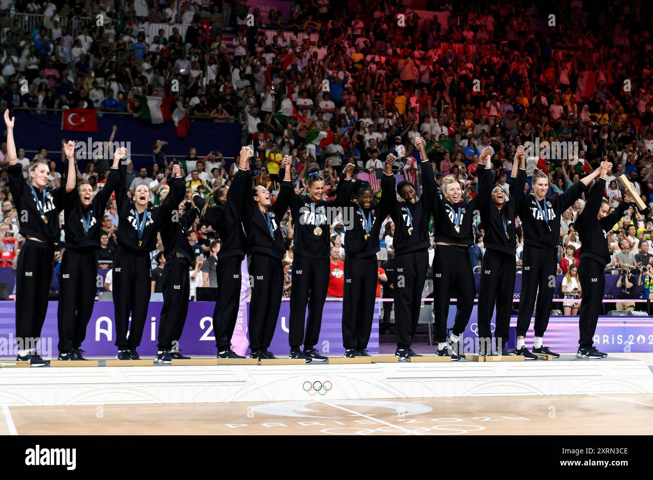 Paris, France. 11th Aug, 2024. Italian players celebrate during the medal ceremony at the end of the Volleyball gold medal match between United States of America and Italy of the Paris 2024 Olympic Games at Arena Paris Sud 1 in Paris (France), August 11, 2024. Italy defeated United States 3-0 and won the gold medal. Credit: Insidefoto di andrea staccioli/Alamy Live News Stock Photo