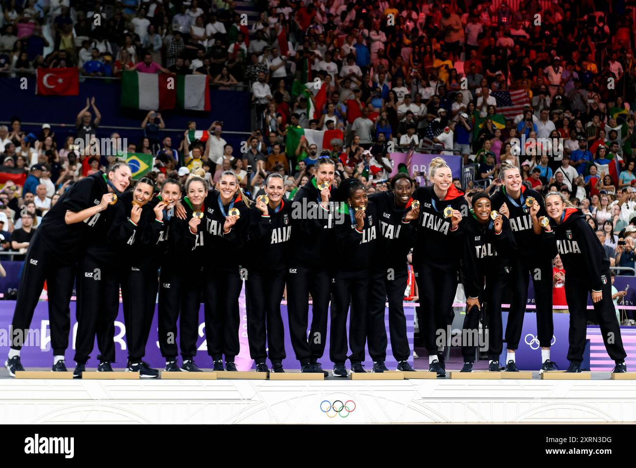 Paris, France. 11th Aug, 2024. Italian players celebrate during the medal ceremony at the end of the Volleyball gold medal match between United States of America and Italy of the Paris 2024 Olympic Games at Arena Paris Sud 1 in Paris (France), August 11, 2024. Italy defeated United States 3-0 and won the gold medal. Credit: Insidefoto di andrea staccioli/Alamy Live News Stock Photo