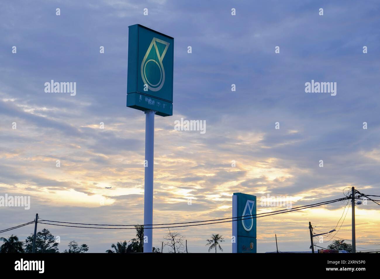 Petronas petrol station sign seen during sunset. Daily life photo of Petronas gas station at Kuala Lumpur. (Photo by Faris Hadziq / SOPA Images/Sipa USA) Stock Photo