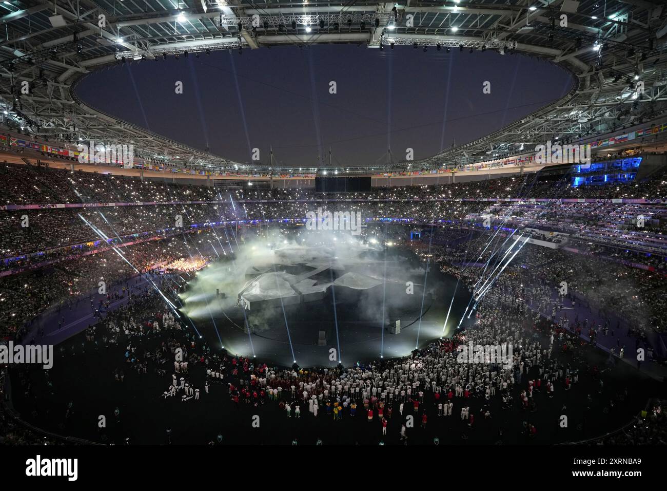 Participants attend the 2024 Summer Olympics closing ceremony at the ...