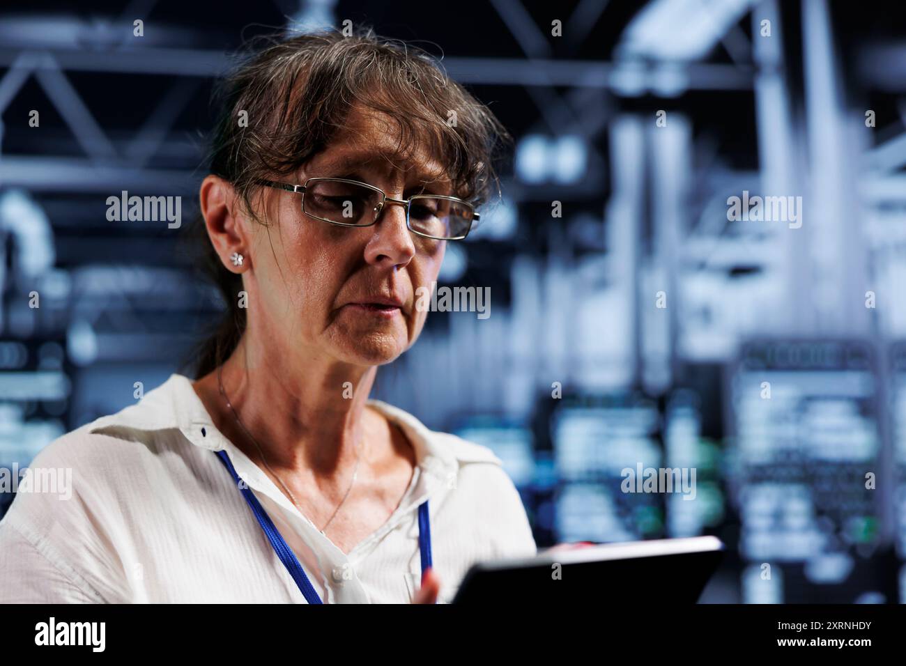 Precise serviceman in high tech business providing computing resources needed for AI to process extensive datasets for training. Server equipment storing datasets used for machine learning, close up Stock Photo