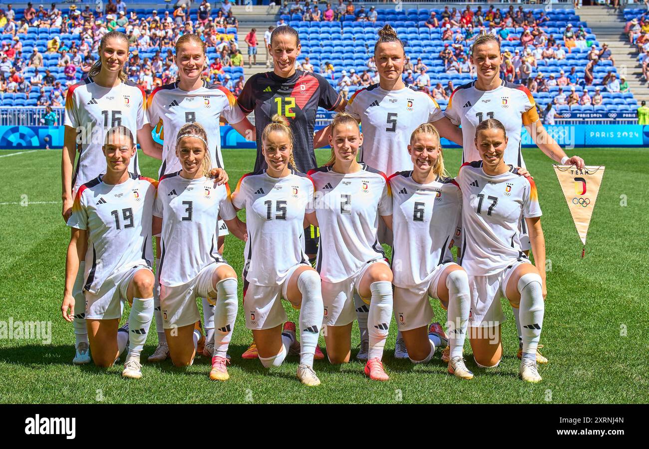 Teams presentation and anthem: Alexandra Popp, DFB Frauen 11 Ann-Katrin Berger, goalkeeper DFB Frauen 12 Marina HEGERING, DFB Frauen 5 Felicitas Rauch, DFB Frauen 19 Kathrin-Julia HENDRICH, DFB Frauen 3 Sarai Linder, DFB Frauen 2 Janina Minge, DFB Frauen 6 Sjoeke Nüsken, DFB Frauen 9 Jule Brand, DFB Frauen 16 Giulia Gwinn, DFB Frauen 15 Klara Bühl, DFB Frauen 17  at the women Olympic Bronze Medal match GERMANY - SPAIN 1-0 at Stade de Lyon in Lyon  at Aug 9, 2024 in Lyon, France.   Season 2024/2025 Photographer: Peter Schatz Stock Photo