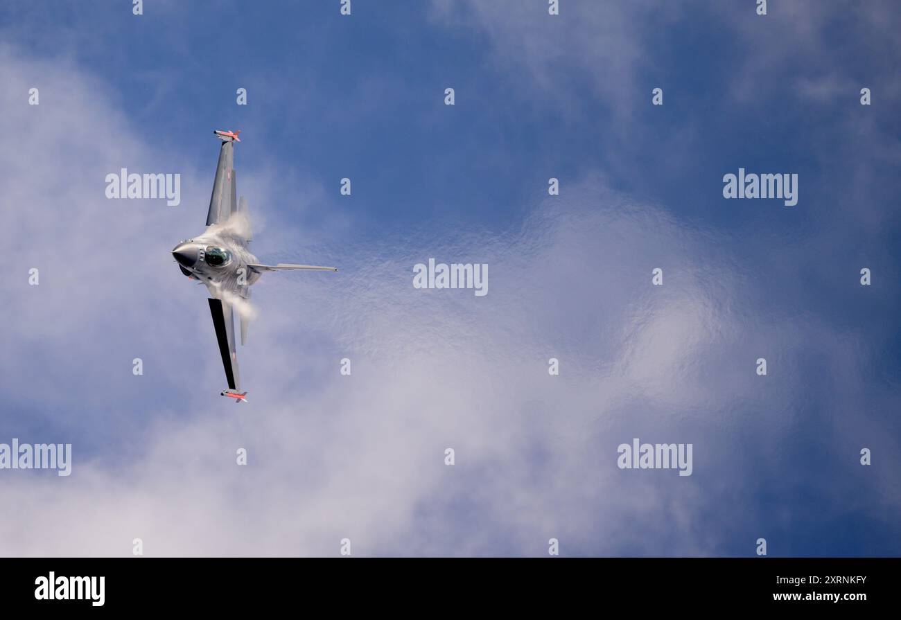 Lockheed Martin, Royal Danish Air Force, F-16AM  Fighting Falcon turning and burning during flying display at the Royal International Air Tattoo Stock Photo