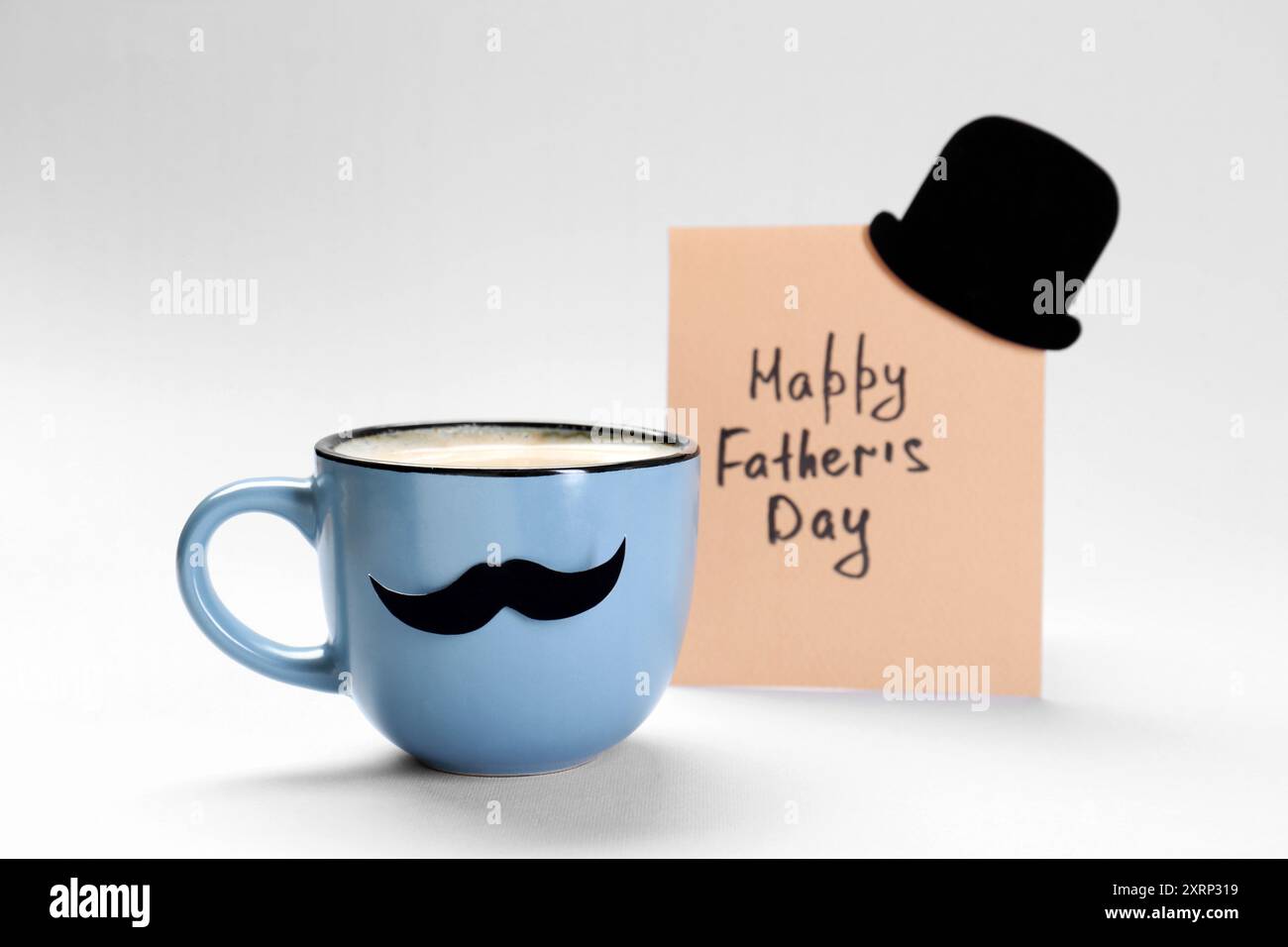 Greeting card with phrase Happy Father's Day and cup of coffee with ...
