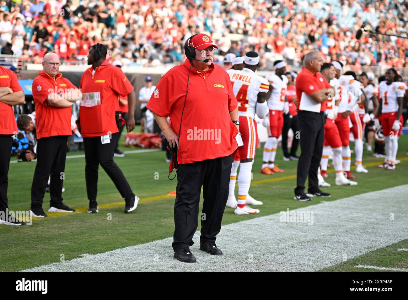 Kansas City Chiefs head coach Andy Reid, center, stands on the sideline  before a preseason NFL football game against the Jacksonville Jaguars,  Saturday, Aug. 10, 2024, in Jacksonville, Fla. (AP Photo/Phelan M.