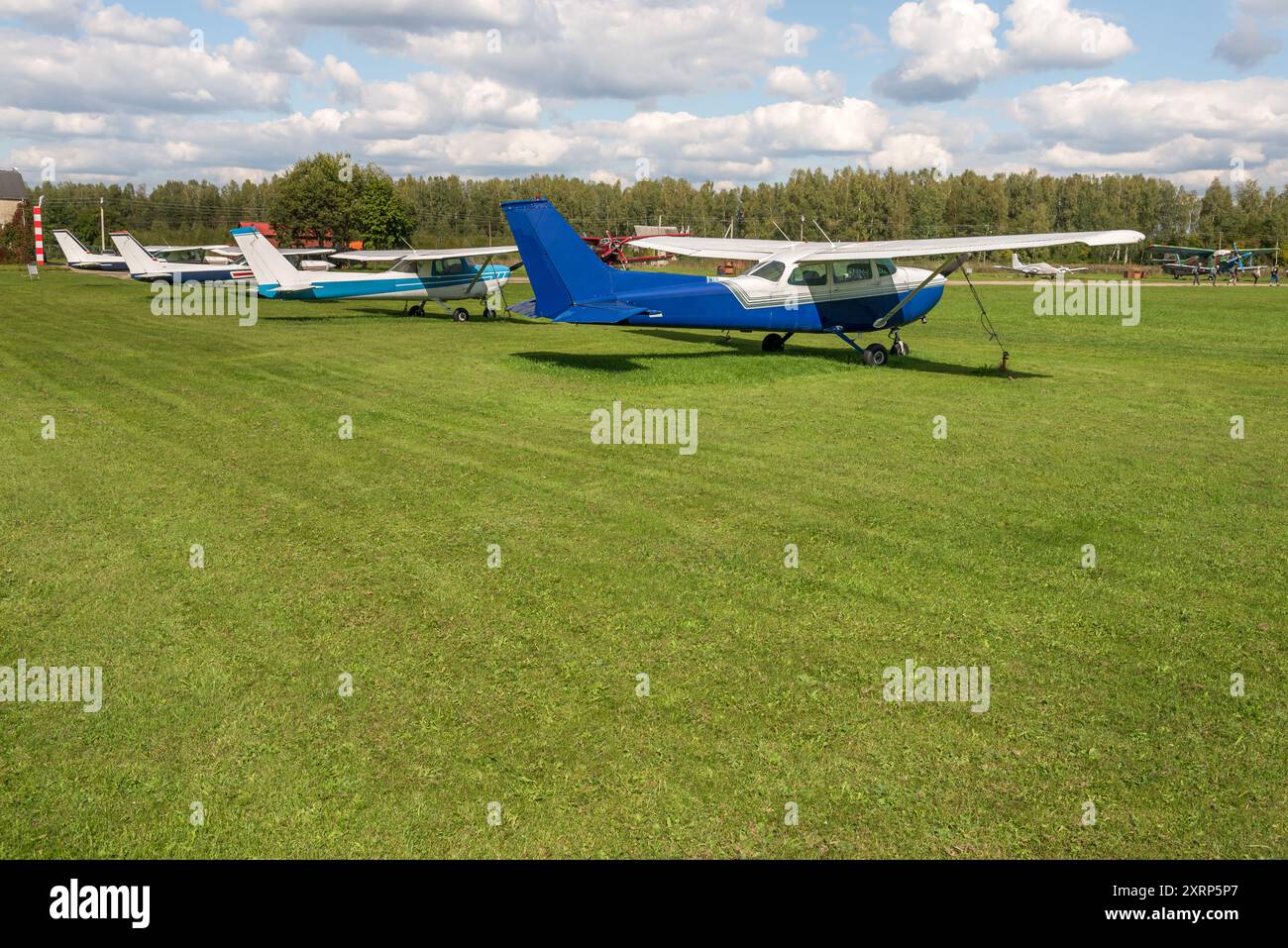 Airplane in green grass on hi-res stock photography and images - Alamy