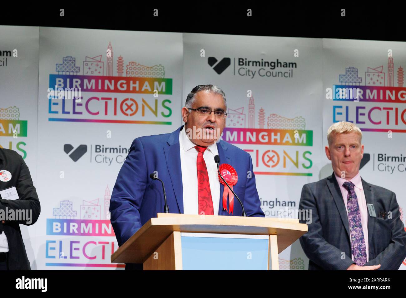 Labour MP Tahir Ali (left) retaining the Birmingham Hall Green and Moseley seat at the General Election Count. Tahir Ali won the seat in 2019 replacing Roger Godsiff as the Labour candidate. Stock Photo