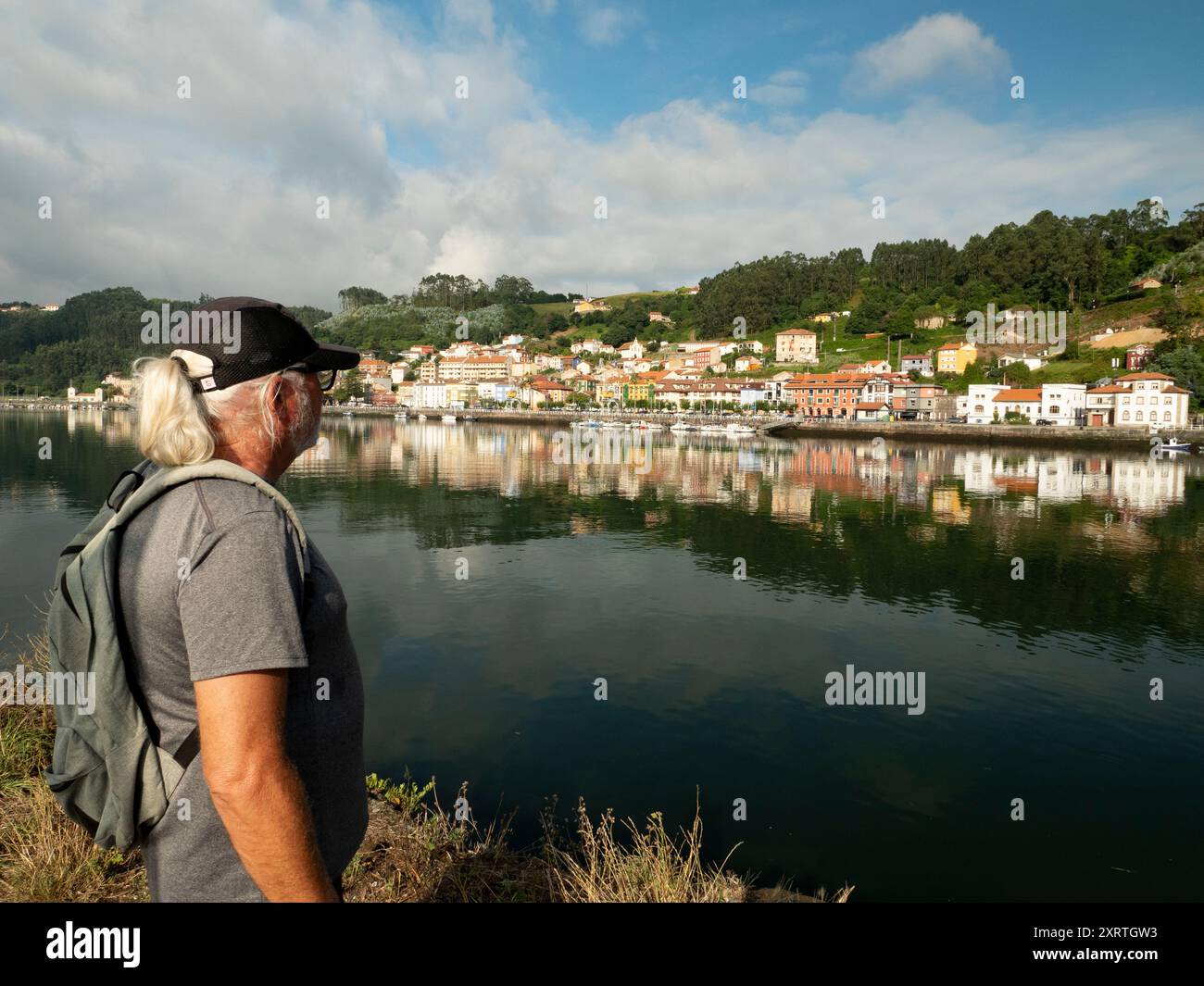 Cool middle aged man hiking and contemplating view in Northern Spain Stock Photo